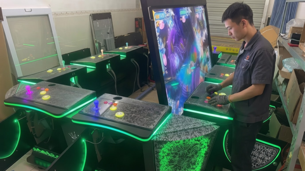 Technician testing fish game software settings on a multiplayer arcade machine