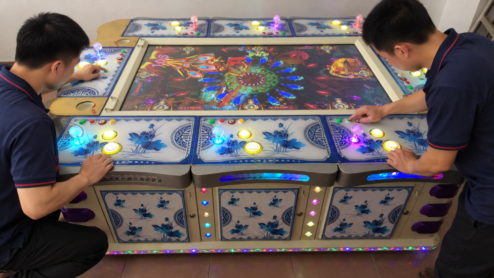 Fishing game machine player controls and payment system tested before shipment
